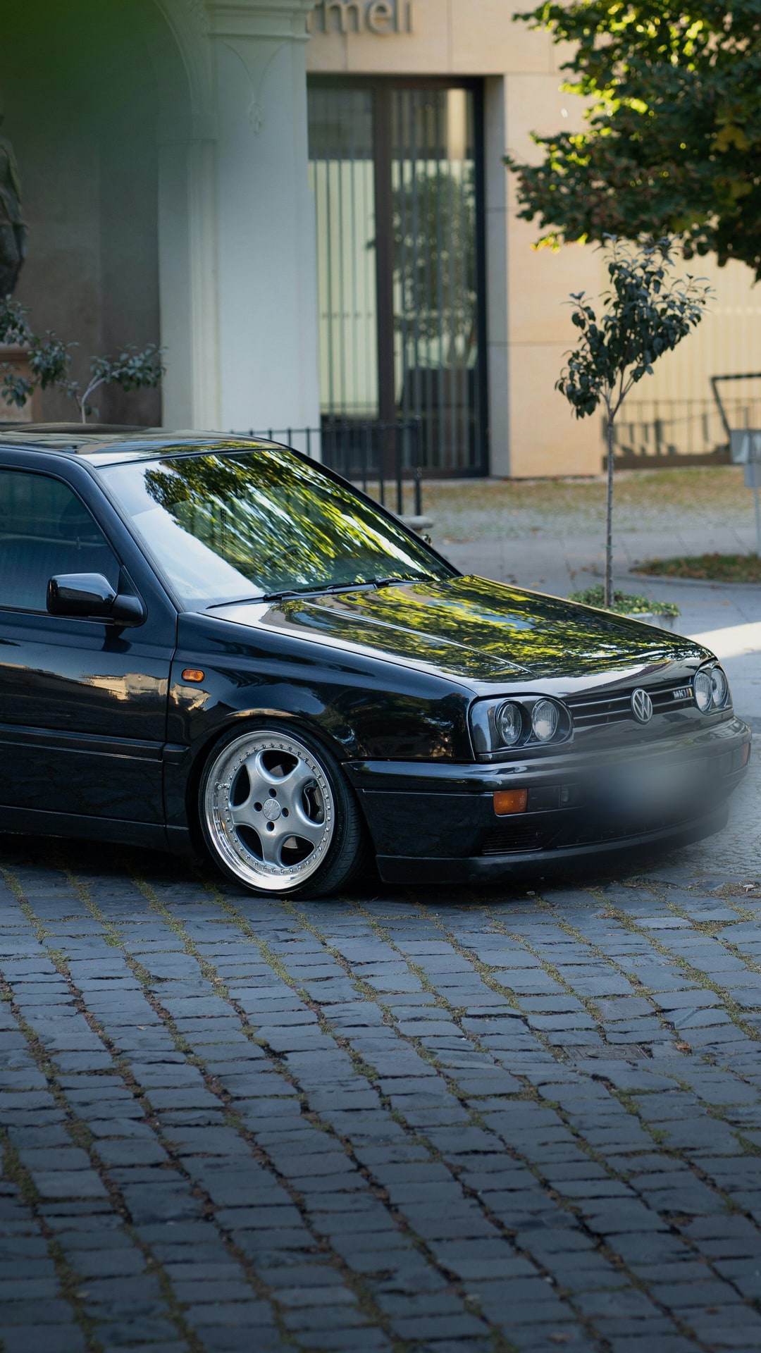 not mine sadly. mk3 sitting on proper splits, just parked there on the cobbles like it owns the place