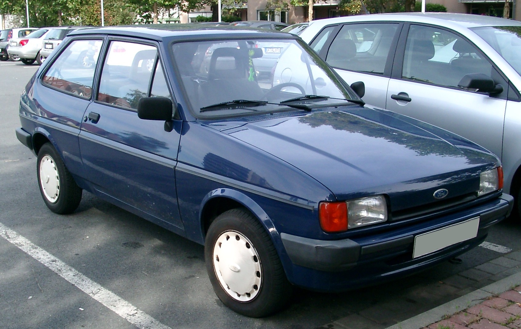 It was one of the first small cars to offer features like a sunroof and more sophisticated interior trim levels, appeali