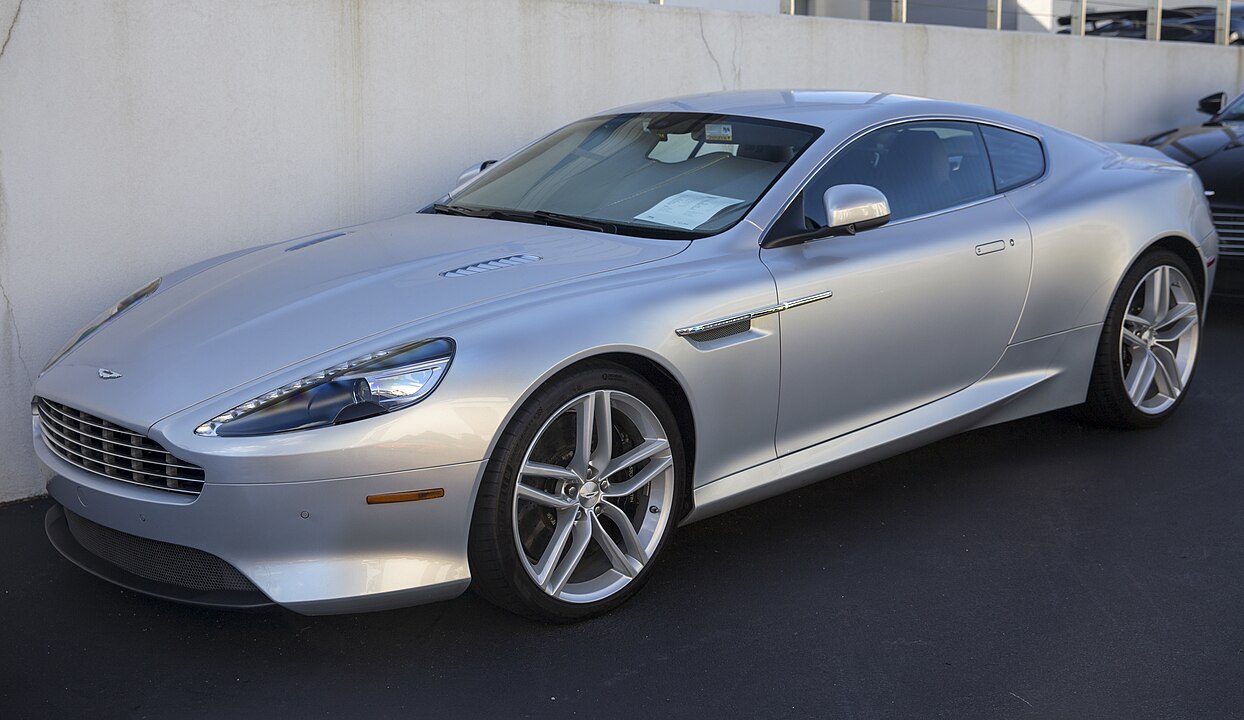 Designed by Henrik Fisker, the DB9 introduced Aston Martin's iconic "vertical-horizontal" design language, characterized