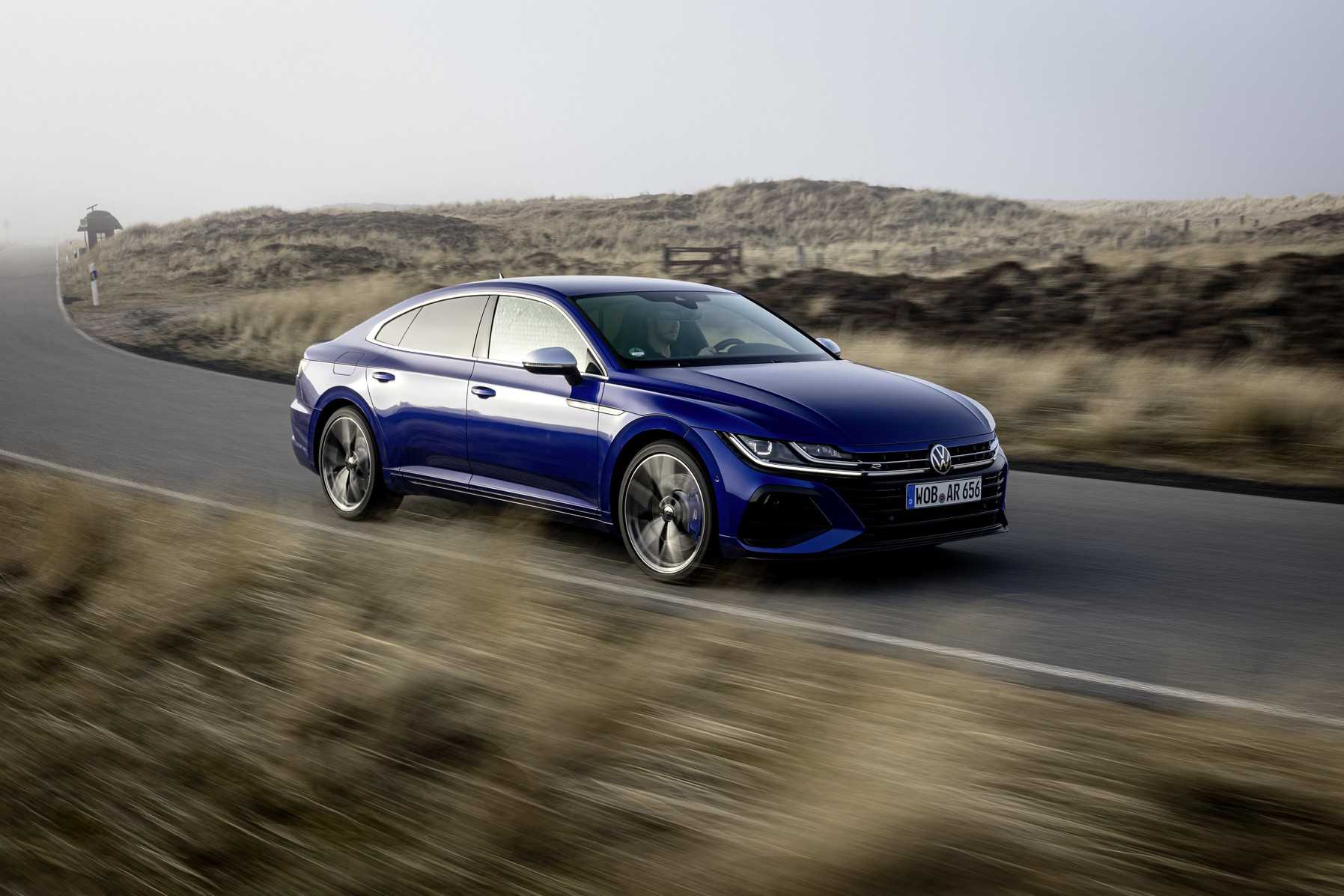 The Volkswagen Arteon sleek, low-slung, and athletic silhouette was inspired by the streamlined profile of sharks, aimin