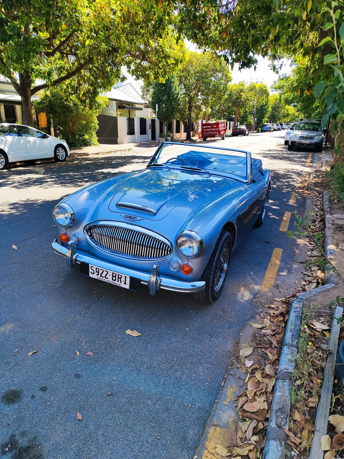 $Aksel checking out one of his new neighbours cars. A gorgeous Austin Healey 3000 Mark III